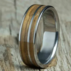 Titanium ring made with Whiskey barrel wood