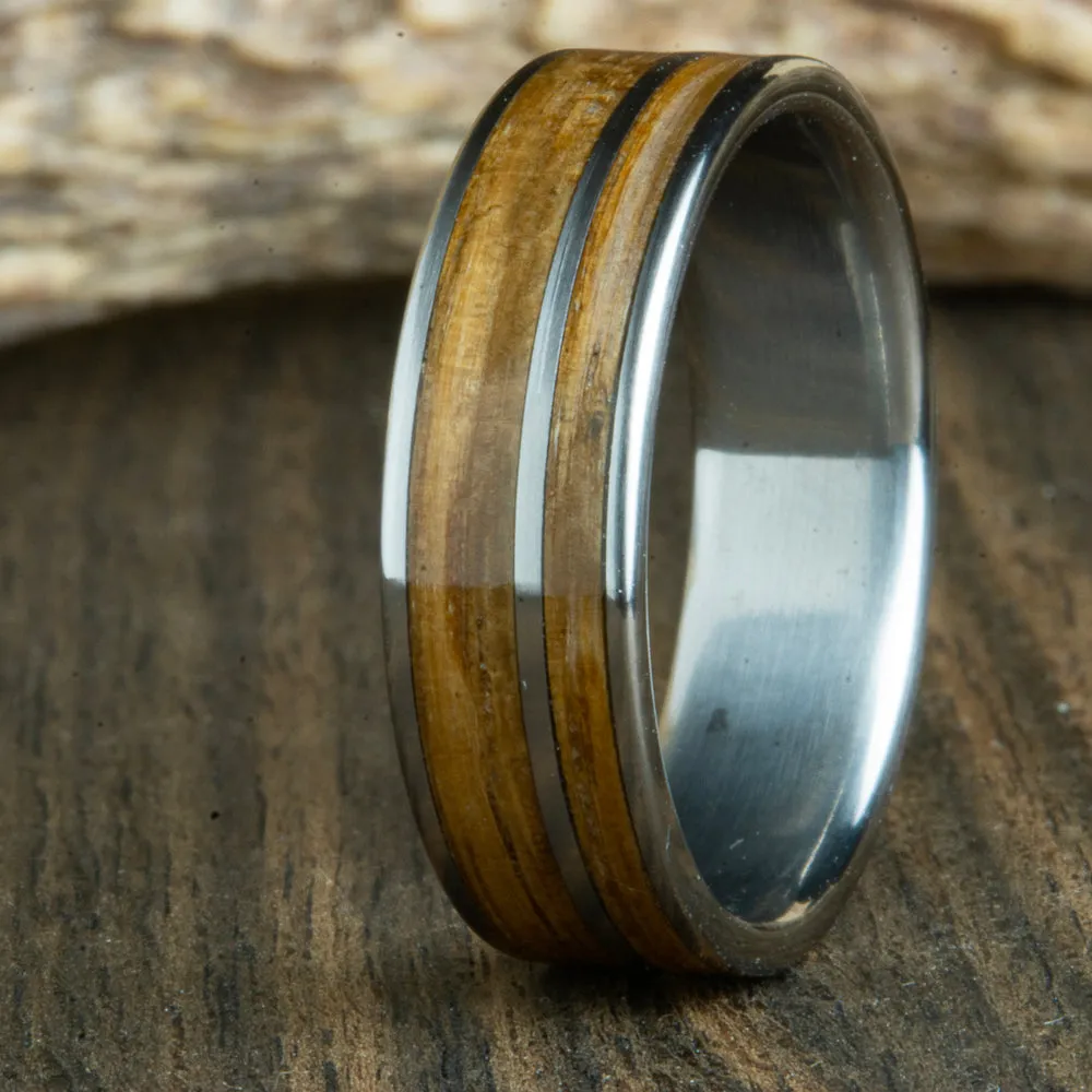 Titanium ring made with Whiskey barrel wood